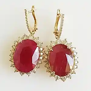 Oorbellen van 18 karaats roségoud met natuurlijke robijnen en diamanten. kopen? Bied vanaf 3400!