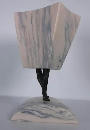Hans Rikken - Pendant: Set van twee sculpturen uit marmer en brons, Man + Vrouw + 2 boeken kopen? Bied vanaf 150!