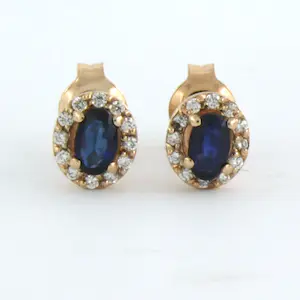 14k rose gouden entourage oorknoppen bezet met robijn en diamant 0.13 ct kopen? Bied vanaf 210!
