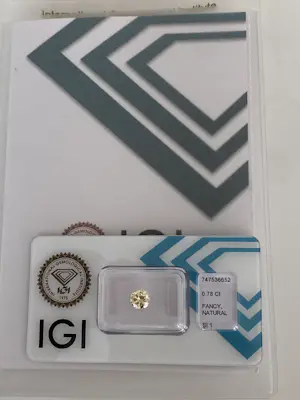 IGI-gecertificeerde natuurlijke Fancy Light Yellow diamant,0,78 karaat kopen? Bied vanaf 1200!