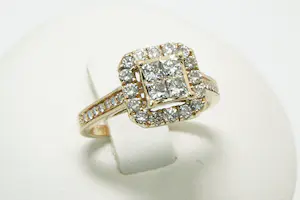 98 - Klassieke 14Kt goud & diamanten ring - brilliant en princess cut - 1.25ct kopen? Bied vanaf 580!