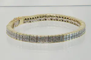 19 - 18 karaats geelgouden armband met ca 13 crt princess geslepen diamanten kopen? Bied vanaf 4850!