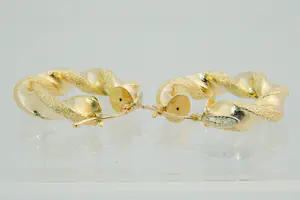 80- paar 18 Krt geel gouden holle & "gedraaide" oorringen kopen? Bied vanaf 200!