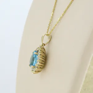 14k gouden collier en hanger bezet met topaas en briljant geslepen diamant kopen? Bied vanaf 320!