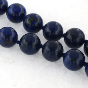18k gouden slot aan een Lapis Lazuli kralen snoer - 65 cm lang - 156 gram kopen? Bied vanaf 200!