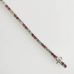 Diamanten en robijnen armband kopen? Bied vanaf 1450!