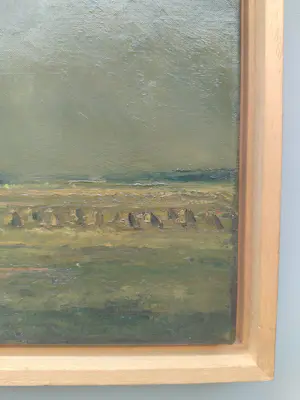 Ad van der Kop - Polderlandschap met korenschoven onder een dreigende lucht kopen? Bied vanaf 45!