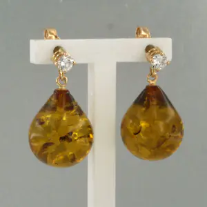 18k gouden oorhangers met barnsteen en briljant geslepen diamant tot. 0.18ct kopen? Bied vanaf 340!