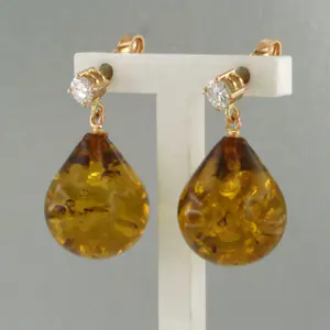 18k gouden oorhangers met barnsteen en briljant geslepen diamant tot. 0.18ct kopen? Bied vanaf 340!