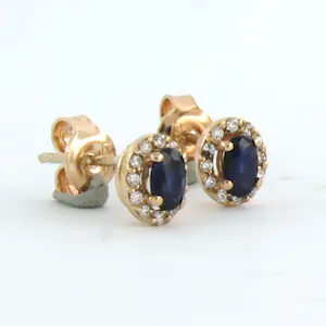 14k rose gouden entourage oorknoppen bezet met robijn en diamant 0.13 ct kopen? Bied vanaf 210!