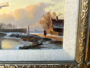 Anton Karssen - Winters landschap met vrouw op een pad bij een molen kopen? Bied vanaf 390!