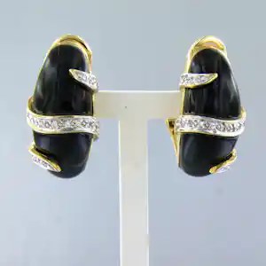18k bicolour gouden oorclips met onyx en briljant geslepen diamant tot. 0.20ct kopen? Bied vanaf 1400!