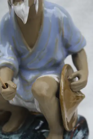 Niet of onleesbaar gesigneerd - Paar Chinese keramische Mud Man Fisherman-beeldjes (Midden 20e eeuw) kopen? Bied vanaf 1!