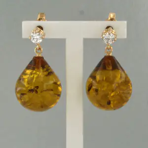 18k gouden oorhangers met barnsteen en briljant geslepen diamant tot. 0.18ct kopen? Bied vanaf 340!