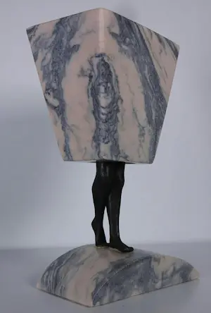 Hans Rikken - Pendant: Set van twee sculpturen uit marmer en brons, Man + Vrouw + 2 boeken kopen? Bied vanaf 150!
