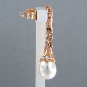 14k rosé gouden oorhangers bezet met parel en 8 kant geslepen diamant tot.0.34ct kopen? Bied vanaf 440!