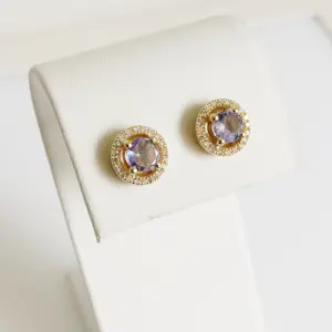Oorbellen van tanzaniet met een diamanten halo. kopen? Bied vanaf 700!