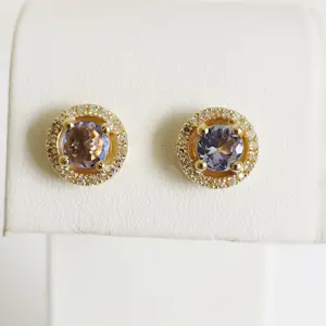 Oorbellen van tanzaniet met een diamanten halo. kopen? Bied vanaf 700!