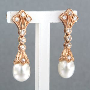 14k rosé gouden oorhangers bezet met parel en 8 kant geslepen diamant tot.0.34ct kopen? Bied vanaf 440!