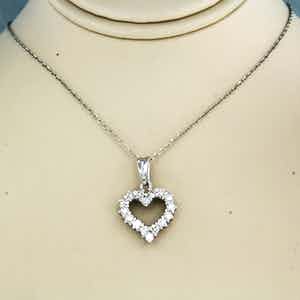 18K Goud - witgouden collier met een hanger bezet met briljant geslepen diamant 0.30 ct. verkocht voor € 300!