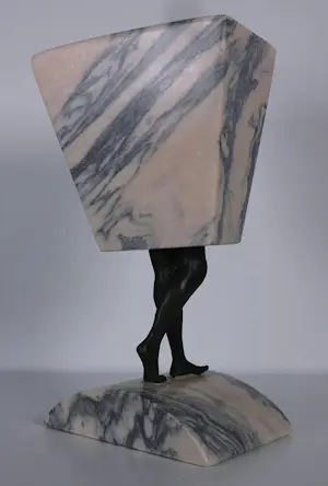 Hans Rikken - Pendant: Set van twee sculpturen uit marmer en brons, Man + Vrouw + 2 boeken kopen? Bied vanaf 150!