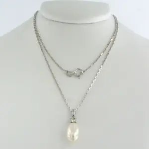 14k witgouden collier en hanger met parel en diamant 0.10ct kopen? Bied vanaf 340!