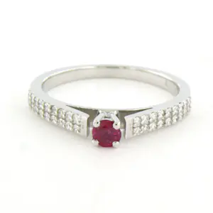 18k gouden ring met robijn tot. 0.25ct en briljant geslepen diamant tot. 0.24ct kopen? Bied vanaf 650!