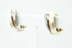 Prachtige set 18 krt bi-color gouden dames oorclips gezet met ca 0.30ct diamant. kopen? Bied vanaf 350!