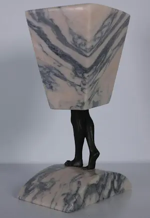 Hans Rikken - Pendant: Set van twee sculpturen uit marmer en brons, Man + Vrouw + 2 boeken kopen? Bied vanaf 150!