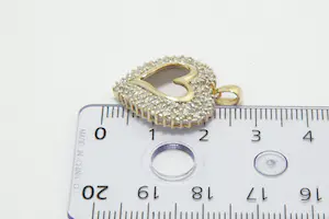 62- Opengewerkte 14 karaat geel-gouden harthanger gezet met ca. 70 steentjes kopen? Bied vanaf 70!