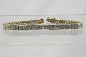 19 - 18 karaats geelgouden armband met ca 13 crt princess geslepen diamanten kopen? Bied vanaf 4850!
