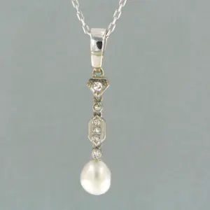 14k witgouden collier met hanger bezet met parel en diamant kopen? Bied vanaf 250!