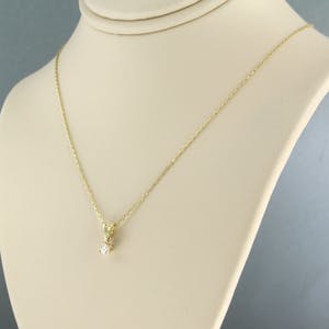 14k gouden collier en een solitair hanger met oud briljant geslepen diamant kopen? Bied vanaf 160!