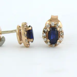 14k rose gouden entourage oorknoppen bezet met robijn en diamant 0.13 ct kopen? Bied vanaf 210!