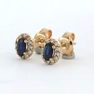 14k rose gouden entourage oorknoppen bezet met robijn en diamant 0.13 ct kopen? Bied vanaf 210!
