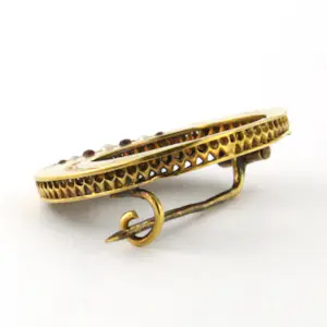 14k gouden broche bezet met robijn en parel kopen? Bied vanaf 190!