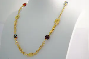 142 -  Lang (50+cm) Surinaams 18 Krt gouden zg. Ala Kondre hals sieraad ketting kopen? Bied vanaf 980!