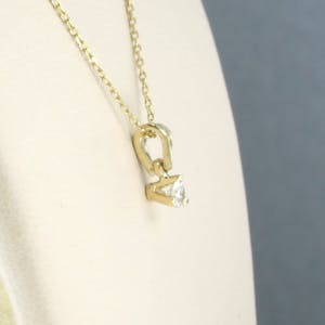 14k gouden collier en een solitair hanger met oud briljant geslepen diamant kopen? Bied vanaf 160!