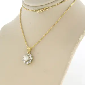 18k geelgouden collier met goud met platina hanger met parel en diamant kopen? Bied vanaf 900!