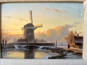 Anton Karssen - Winters landschap met vrouw op een pad bij een molen kopen? Bied vanaf 390!