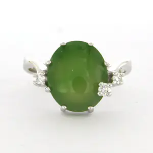 14k wit gouden ring bezet met jade en briljant geslepen diamant tot. 0.10ct kopen? Bied vanaf 350!