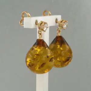 18k gouden oorhangers met barnsteen en briljant geslepen diamant tot. 0.18ct kopen? Bied vanaf 340!