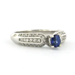 14k gouden ring met saffier en briljant geslepen diamant tot. 0.26ct kopen? Bied vanaf 675!