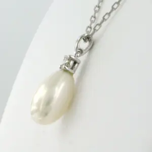 14k witgouden collier en hanger met parel en diamant 0.10ct kopen? Bied vanaf 340!