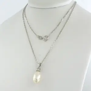 14k witgouden collier en hanger met parel en diamant 0.10ct kopen? Bied vanaf 340!