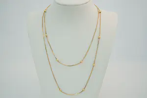 17 - Sierlijk en lang 14 Krt geel gouden venetiaans collier met balletjes kopen? Bied vanaf 540!