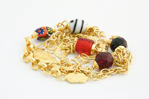 142 -  Lang (50+cm) Surinaams 18 Krt gouden zg. Ala Kondre hals sieraad ketting kopen? Bied vanaf 980!