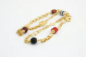 142 -  Lang (50+cm) Surinaams 18 Krt gouden zg. Ala Kondre hals sieraad ketting kopen? Bied vanaf 980!