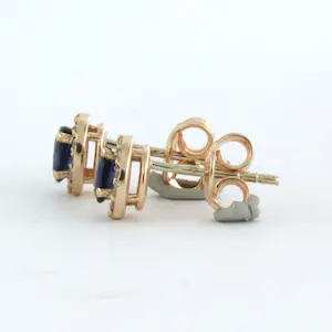 14k rose gouden entourage oorknoppen bezet met robijn en diamant 0.13 ct kopen? Bied vanaf 210!