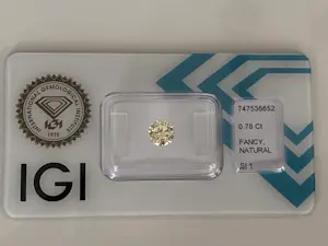 IGI-gecertificeerde natuurlijke Fancy Light Yellow diamant,0,78 karaat kopen? Bied vanaf 1200!